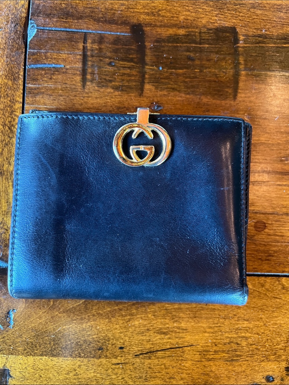 Gucci Black Leather Women's Wallet with Gold Emblem